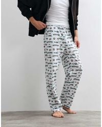 ASOS - Christmas Pyjama Bottoms With Festive Village Graphic - Lyst