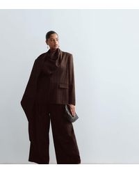 ARRANGE - Curve Tailored Barrel Leg Pants - Lyst