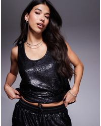 ASOS - Top d'ensemble ajusté sans manches à sequins - noir - Lyst