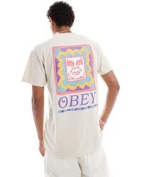 Obey - Camiseta color piedra con estampado en la espalda y acabado tintado - Lyst