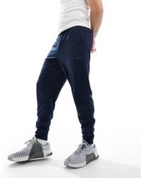 Nike - Totality Knit Tapered Sweatpants - Lyst