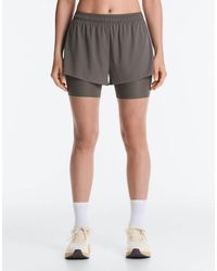 Oysho - Mid Rise 2-in-1 Technical Shorts - Lyst