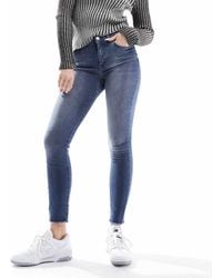 ONLY - – knöchellange jeans mit engem schnitt aus blauem denim - Lyst