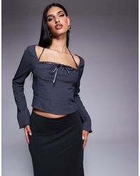 Princess Polly - Top Met Halternek, Wijde Mouwen En Strikdetail - Lyst