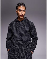 ARMANI EXCHANGE - Sweat à capuche d'ensemble avec imprimé logo intégral - Lyst