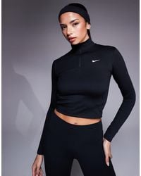Nike - Nike - one training - top ajusté, à manches longues et col zippé - Lyst