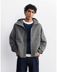 Pull&Bear - Imperméable léger à capuche - Lyst
