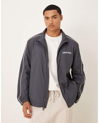 Calvin Klein - Chaqueta Azul De Corte Estándar Con Cuello De Solapas Y Detalles Blancos De - Lyst