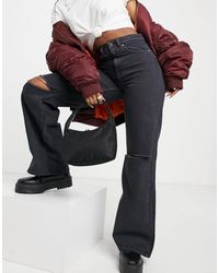 Jeans a zampa d'elefante Bershka da donna - Fino al 50% di sconto | Lyst