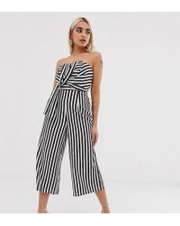 Boohoo Exclusivité - Combinaison bandeau nouée façon jupe-culotte à rayures monochromes - Noir
