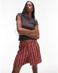 TOPSHOP - Short plissé ample à rayures - Lyst