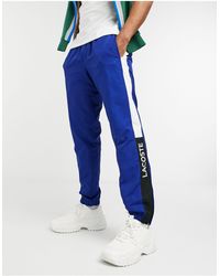 white lacoste joggers