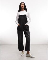 Monki - Denim Jumpsuit Met Wijde Pijpen - Lyst