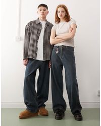 Weekday - Astro - jean unisexe baggy à taille basse - moyen effet strié délavé - Lyst