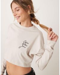 Calvin Klein - Script Logo Crop Long Sleeve T-shirt - Lyst