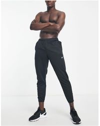 Nike - Joggers s therma-fit challenger repel - Lyst