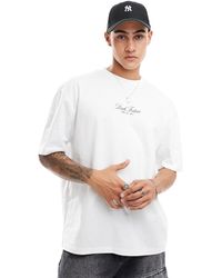 ASOS - T-shirt oversize bianca con scritta sul petto - Lyst