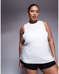4505 - Curve Icon Quick Dry Performance Drop Armhole Vest - Lyst