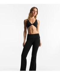Bershka - Petite Technical Flared Trousers With Turn-down Waist - Lyst
