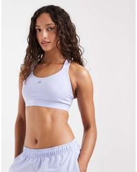 New Balance - Essential Train Sports Bra - Lyst