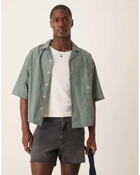 ASOS - Pantaloncini Di Jeans Taglio Corto Slim Neri Con Strappi - Lyst
