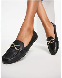 sandalias y chanclas de Mocasines Mocasines s con suela gruesa dentada grandwalk de ALDO de color Negro Mujer Zapatos de Zapatos planos 
