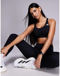 adidas Originals - Adidas Training Optime Essentials Mid Support Sports Bra - Lyst