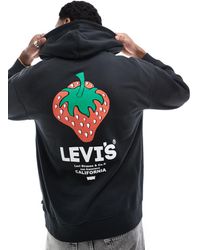 Levi's - Felpa con cappuccio nera con stampa di logo e fragola sul retro - Lyst