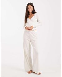 Miss Selfridge - Pantaloni Traforati A Fondo Ampio Color Panna - Lyst