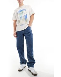 Only & Sons - Vaqueros holgados con lavado azul medio y cinco bolsillos - Lyst