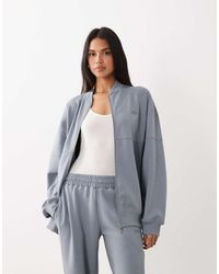 Kaiia - Oversized Jack Van Premium Katoen Met Rits En Interlocknaden - Lyst