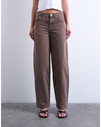 TOPSHOP - Cinch Low Rise Relaxed Jeans - Lyst