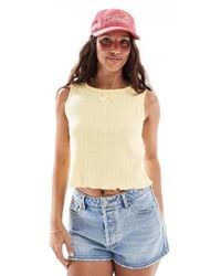 Pieces - Sleeveless Cropped Pointelle Top With Bow Trim - Lyst