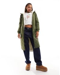ONLY - Cappotto Trapuntato Taglio Lungo Con Cappuccio Effetto Teddy Kaki - Lyst