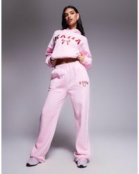 Kaiia - Joggers Rosas Y Rojos De Pernera Ancha Con Lazo Y Logo Bordados De (Parte De Un Conjunto) - Lyst