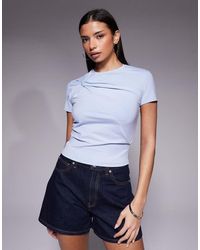 GOOD AMERICAN - Sculpting Twist Tee - Lyst