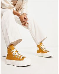 Converse - Chuck taylor all star lift hi - sneakers alte oro con suola platform - Lyst