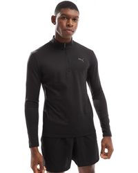 PUMA - Evolve Training Slim 1/4 Zip Sweatshirt - Lyst