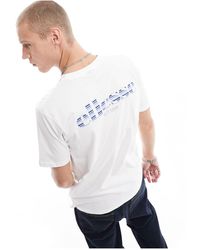 Ellesse - Camiseta blanca con estampado gráfico trasero floresce - Lyst