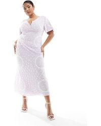 ASOS - Exclusivité asos design curve - robe mi-longue à manches évasées et décolleté plongeant avec motif circulaire ornementé - lilas - Lyst