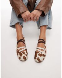 PUMA - – speedcat – flache ballerinas mit kuhmuster - Lyst