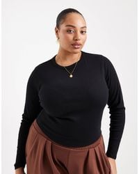 ASOS - Asos design curve - top côtelé à manches longues et col ras - Lyst