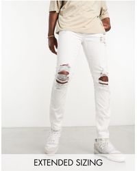 ASOS - Skinny Jeans With Heavy Rips - Lyst