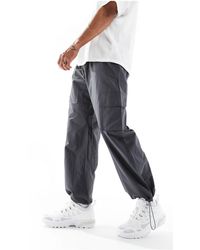 ADPT - Pantalones cargo gris oscuro sueltos - Lyst