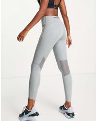 Nike - Fast Dri-fit leggings - Lyst