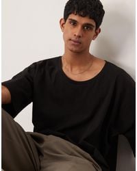ASOS - T-shirt coupe carrée oversize à épaules tombantes avec encolure dégagée - Lyst