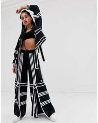 Pantalones anchos y de harem de adidas para mujer | FASHIOLA.mx