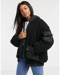 ASOS – e Bomberjacke mit Fleeceakzenten - Schwarz