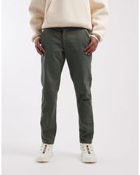 ASOS - Pantalon chino fuselé en tissu stretch confortable - kaki - Lyst