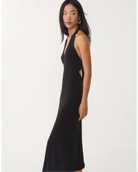 Stradivarius - Robe mi-longue avec détail noué au dos - Lyst